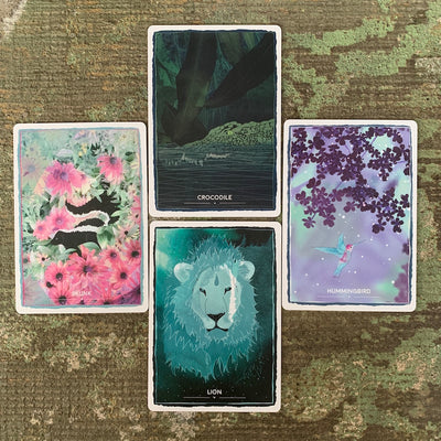 Cards from the Animal Magic Oracle: Crocodile, Skunk, Hummingbird and Lion