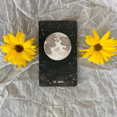 The Moon card from the Empty cup Oracle, a black and white indie deck