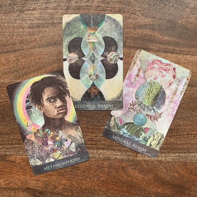 Some of the cards in the Faceted Garden Oracle include humans.