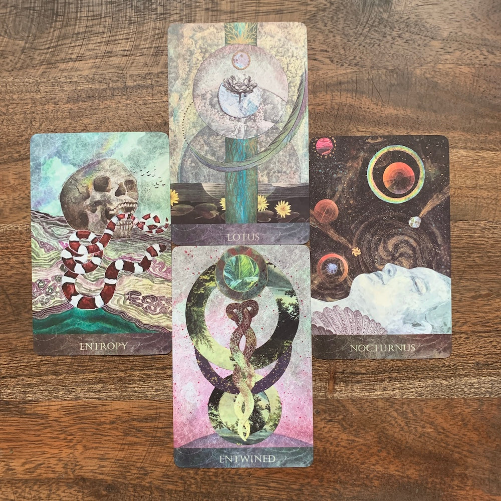 An oracle spread with four cards form the Faceted Garden oracle, and indie deck