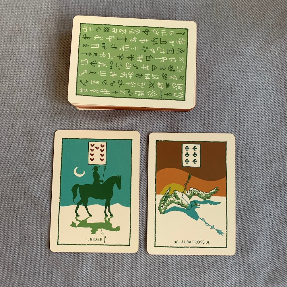 The Green Glyphs Lenormand has a wonderful color palette