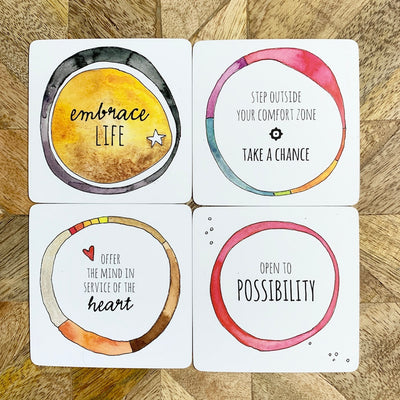 Four cards from the Haven Oracle: inspirational messages in colorful watercolor circles