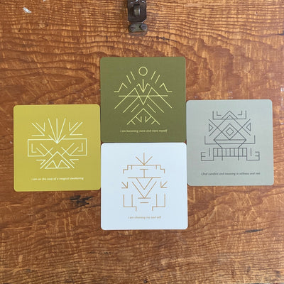 The cards from the Hollow Valley Sigil Oracle have different colored backgrounds. 