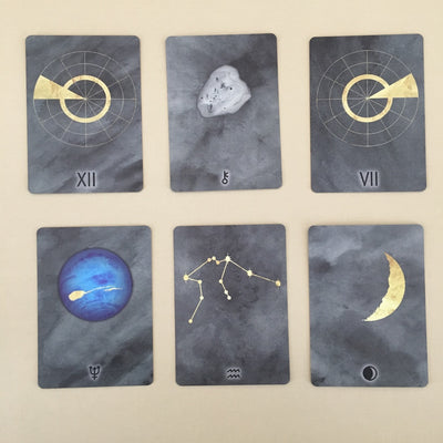 The Living Wheel Astrology deck  las houses, planets, zodiac signs and moon phases. 