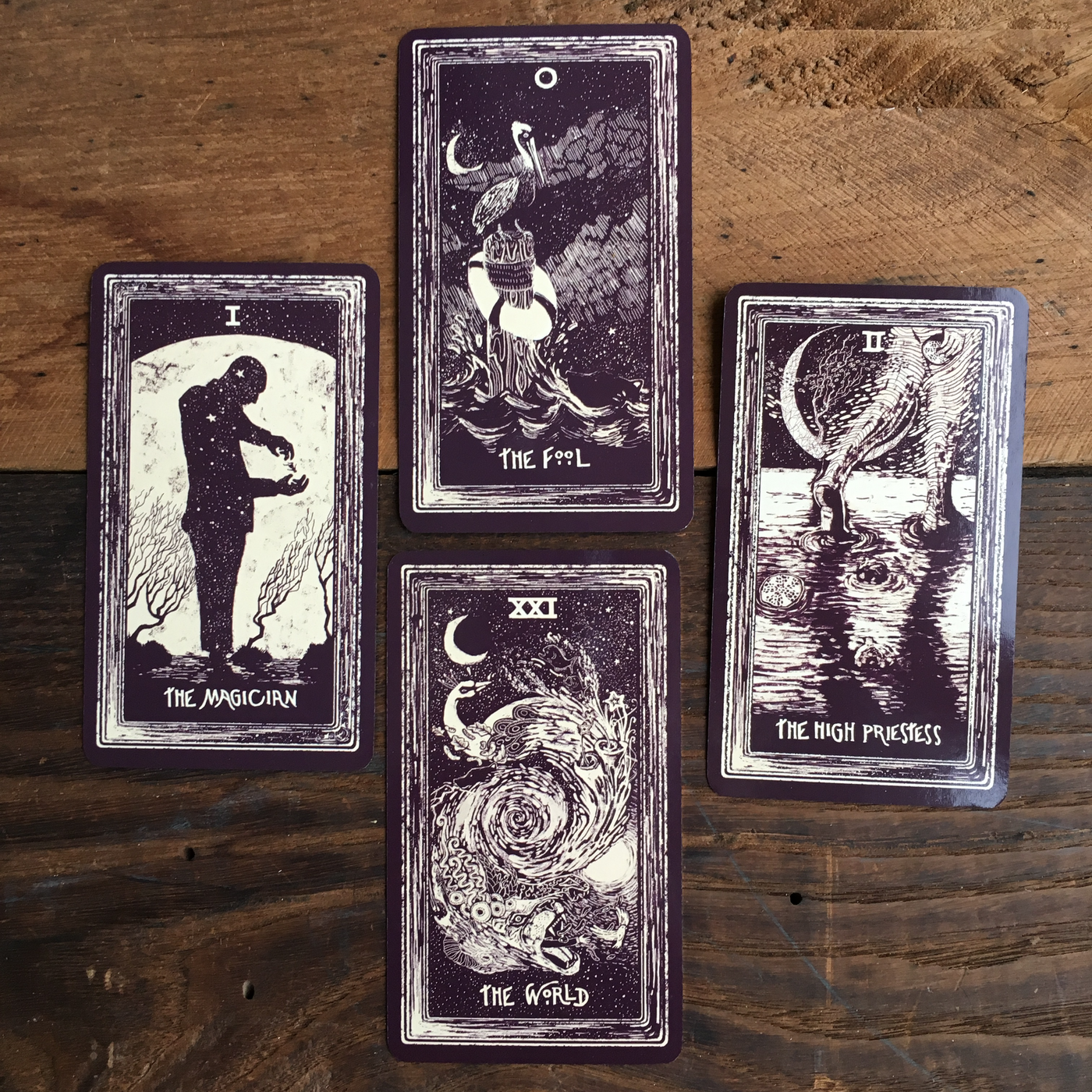 The Fool, Magician, High Priestess, and World cards from the Light Visions Tarot, and indie deck